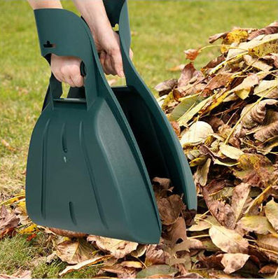 Copas de folhas de plástico e raquete de mão perfeito para limpeza de folhas